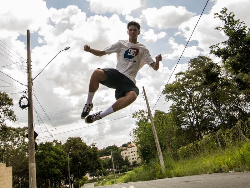 Dynamic shot of a person in mid-motion during an exercise.